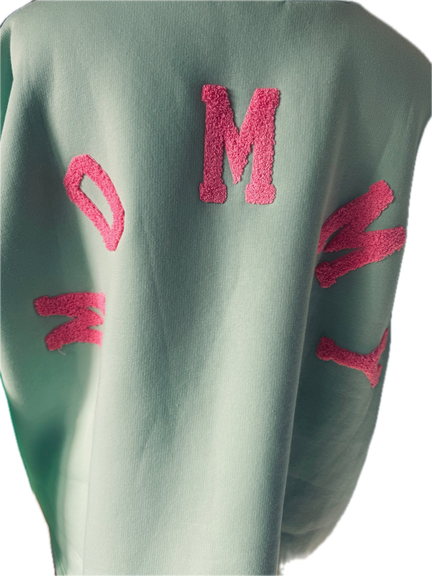 Sweatshirt in mintgrün, Schriftzug hinten in pinkrose